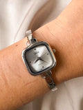 RELOJ QYQ Q52C-500PY ARO PLATEADO