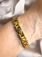 QYQ 55B DORADO NUMEROS PEQUEÑO PULSO DELGADO BROCHE