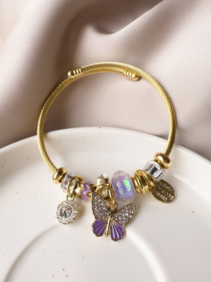 Brazalete con dije de mariposa - Imagen 1