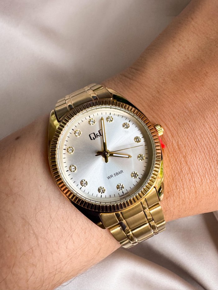 Reloj QYQ Dorado en acero - Imagen 1