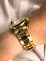 Reloj QYQ dorado en acero - Imagen 2