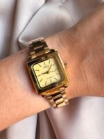 Reloj QYQ dorado pequeño