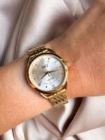 Reloj QYQ dorado pequeño