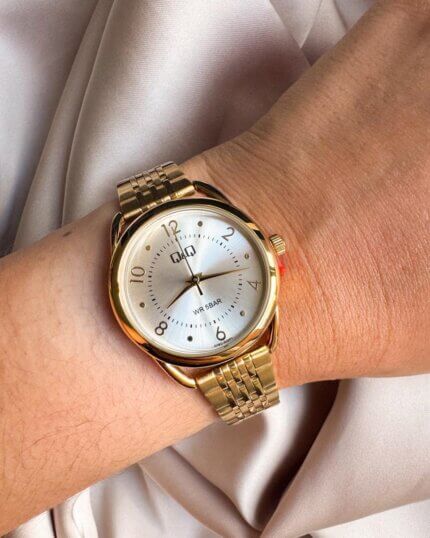 Reloj QYQ dorado pequeño