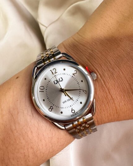 Reloj QYQ Q18C-501PY BICOLOR