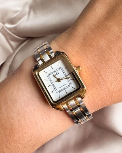 Reloj QYQ bicolor pequeño